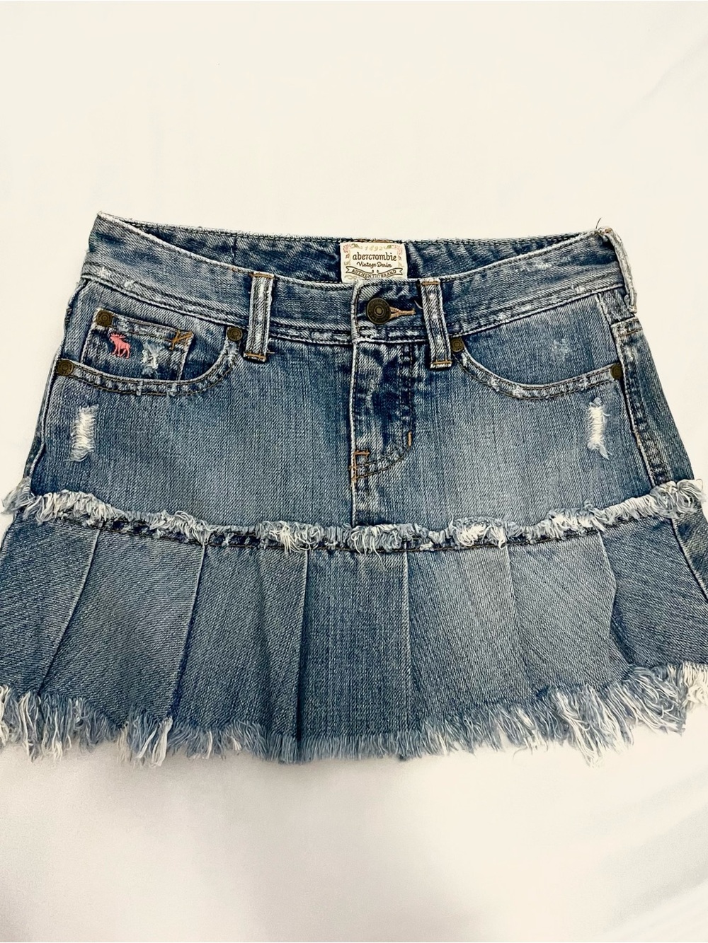 Abercrombie & Fitch Frayed Pleated Denim Mini Skirt in Light Blue